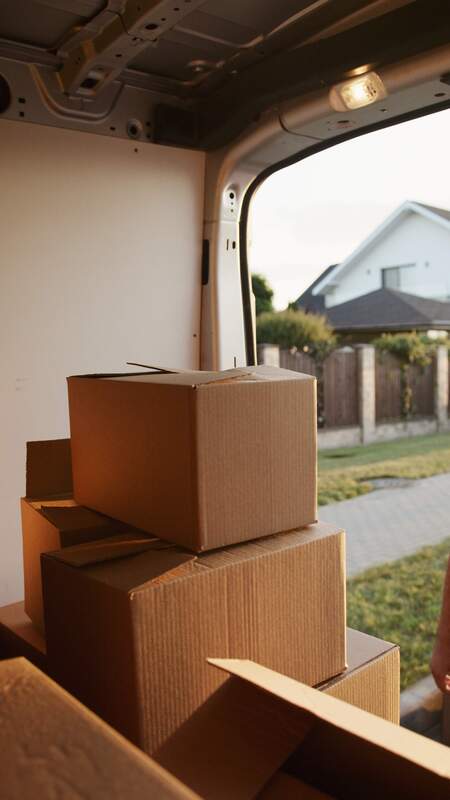 Moving boxes in back of moving truck